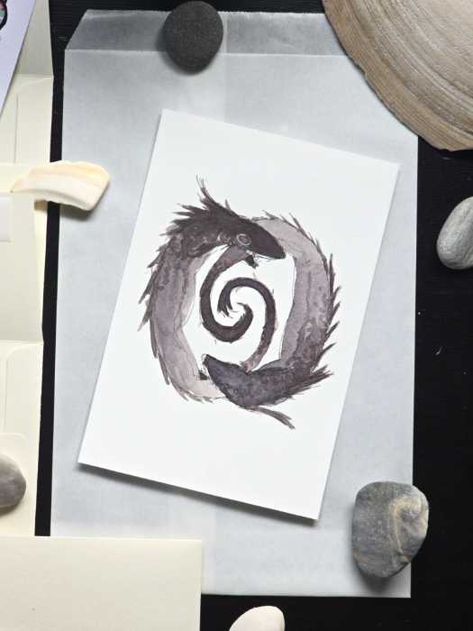 A watercolor painting of two fish biting eachothers tails. The painting is surrounded by little stones and shells.